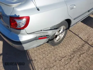 2006 Hyundai Elantra GLS z VIN KMHDN56D66U184805, wystawiony jako IAAI lot #41789615 z przebiegiem 190 140 mil mil oraz . Historia ofert i sprzedaży dostępna na DreamBid. Obrazek 6.
