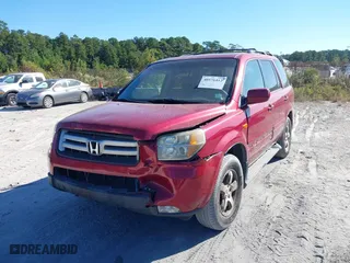 2006 Honda Pilot EX-L with VIN 5FNYF18566B022909, listed as a IAAI auction lot 40576412 with 310,278 mi miles. Bid and sale history available at carsss.com. Image 17.