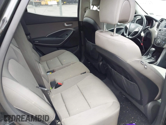 2014 Hyundai Santa Fe z VIN 5XYZUDLB8EG196450, wystawiony jako IAAI lot #42112914 z przebiegiem 91 710 mil mil oraz . Historia ofert i sprzedaży dostępna na DreamBid. Obrazek 8.