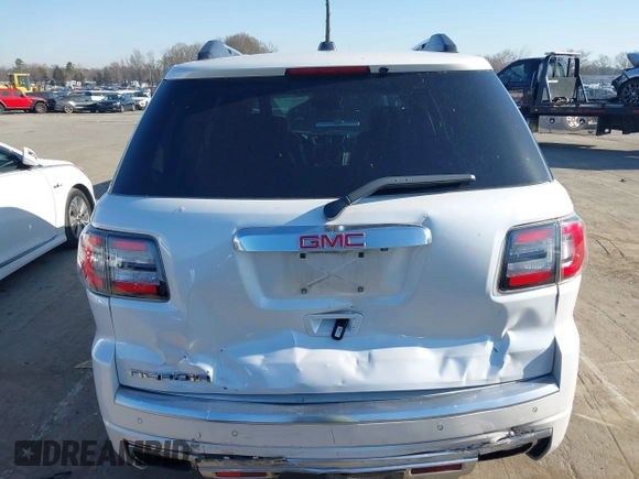 2016 GMC Acadia Denali with VIN 1GKKRTKD4GJ257624, listed as a IAAI auction lot 41769196 with 129,229 mi miles. Bid and sale history available at carsss.com. Image 16.