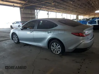 2025 Toyota Camry LE with VIN 4T1DAACKXSU503852, listed as a Copart auction lot 50098065 with 12,003 mi miles and Salvage Title. Bid and sale history available at DreamBid. Image 2.