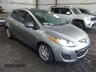 2013 Mazda Mazda2 Sport with VIN JM1DE1KY1D0167999, listed as a IAAI auction lot 41713546 with 204,443 mi miles. Bid and sale history available at carsss.com. Image 1.