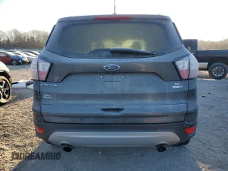 2018 Ford Escape SE z VIN 1FMCU9GD7JUA19262, wystawiony jako Copart lot #84627944 z przebiegiem 89 993 mil mil oraz Szkoda całkowita • Salvage title. Historia ofert i sprzedaży dostępna na DreamBid. Obrazek 6.
