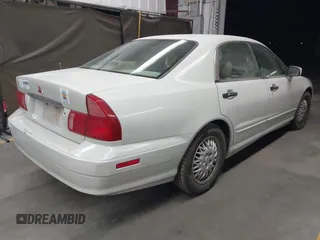 1999 Mitsubishi Diamante z VIN 6MMAP47P4XT003895, wystawiony jako IAAI lot #41992452 z przebiegiem 170 964 mil mil oraz . Historia ofert i sprzedaży dostępna na DreamBid. Obrazek 4.