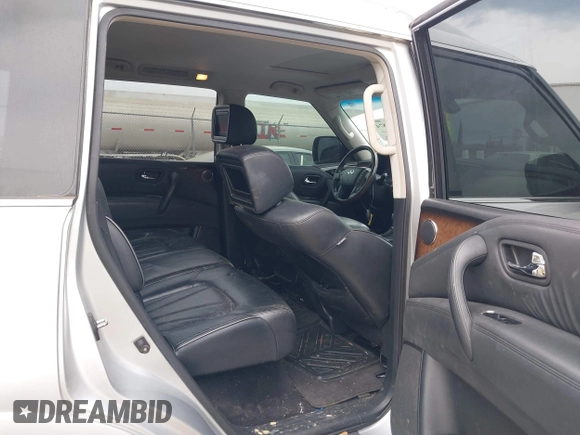 2012 Infiniti QX56 8-passenger with VIN JN8AZ2NC5C9317396, listed as a IAAI auction lot 41879874 with 233,064 mi miles. Bid and sale history available at carsss.com. Image 8.