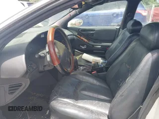 1999 Oldsmobile Aurora z VIN 1G3GR62CXX4100897, wystawiony jako IAAI lot #42277912 z przebiegiem 179 680 mil mil oraz . Historia ofert i sprzedaży dostępna na DreamBid. Obrazek 5.