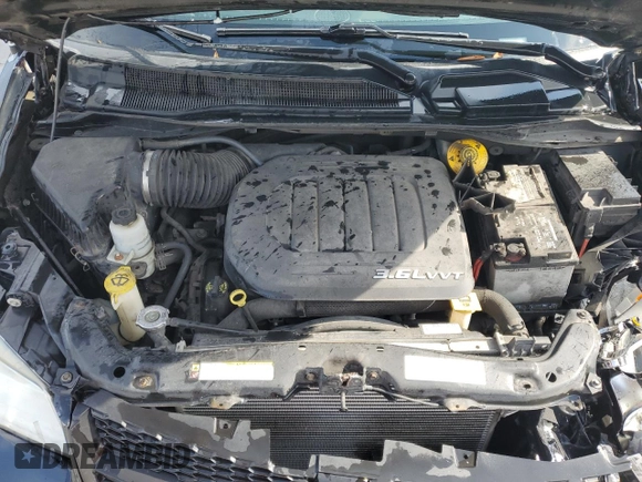2016 Dodge Grand Caravan SXT with VIN 2C4RDGCG7GR181501, listed as a Copart auction lot 53945545 with 84,738 mi miles and Salvage Title. Bid and sale history available at DreamBid. Image 12.