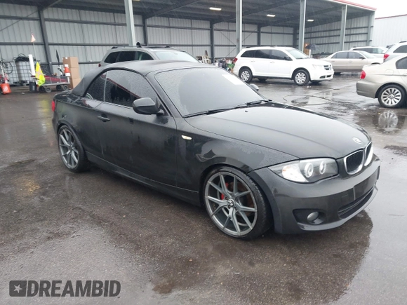 2012 BMW 1 Series 128i with VIN WBAUN1C51CVH84311, listed as a IAAI auction lot 41551912 with 147,052 mi miles and . Bid and sale history available at DreamBid. Image 1.