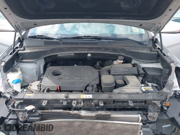 2017 Hyundai Santa Fe 2.4L z VIN 5XYZUDLB6HG400828, wystawiony jako IAAI lot #42013903 z przebiegiem 88 573 mil mil oraz . Historia ofert i sprzedaży dostępna na DreamBid. Obrazek 10.