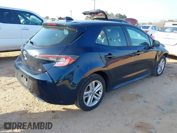 2021 Toyota Corolla Hatchback SE with VIN JTND4MBE9M3114388, listed as a IAAI auction lot 41796303 with 58,656 mi miles. Bid and sale history available at carsss.com. Image 4.