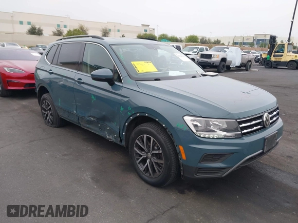 2019 Volkswagen Tiguan SE with VIN 3VV3B7AX3KM113955, listed as a IAAI auction lot 42164890 with 77,806 mi miles and . Bid and sale history available at DreamBid. Image 14.
