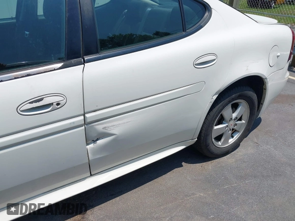 2008 Pontiac Grand Prix z VIN 2G2WP552981132398, wystawiony jako IAAI lot #42668601 z przebiegiem 121 655 mil mil oraz . Historia ofert i sprzedaży dostępna na DreamBid. Obrazek 6.