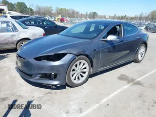 2017 Tesla Model S 100D with VIN 5YJSA1E20HF198503, listed as a IAAI auction lot 41843782 with 77,281 mi miles and . Bid and sale history available at DreamBid. Image 20.