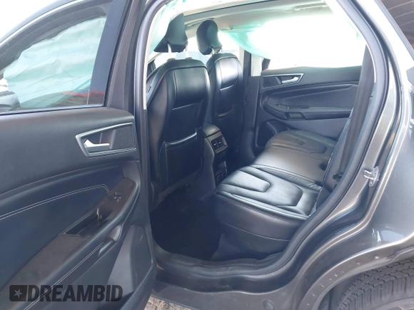 2015 Ford Edge Titanium z VIN 2FMTK3K90FBC12582, wystawiony jako IAAI lot #41860973 z przebiegiem Nie podano mil oraz . Historia ofert i sprzedaży dostępna na DreamBid. Obrazek 8.