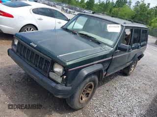 1996 Jeep Cherokee Sport with VIN 1J4FT68S6TL269966, listed as a IAAI auction lot 42211628 with 212,944 mi miles and . Bid and sale history available at DreamBid. Image 2.