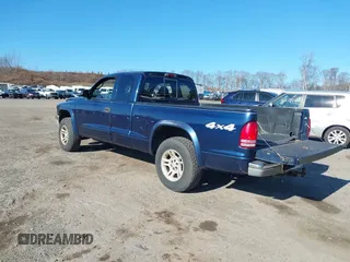 2004 Dodge Dakota SLT with VIN 1D7HG42N64S591353, listed as a IAAI auction lot 41714631 with 186,520 mi miles. Bid and sale history available at carsss.com. Image 3.