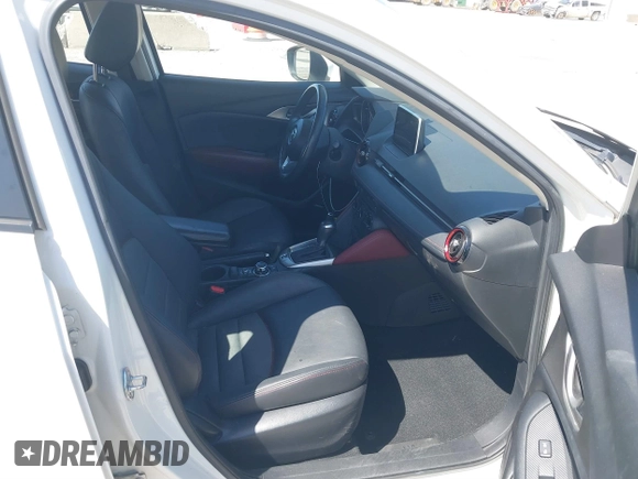 2016 Mazda CX-3 Touring with VIN JM1DKBC71G0126040, listed as a IAAI auction lot 41860285 with 97,986 mi miles and . Bid and sale history available at DreamBid. Image 5.