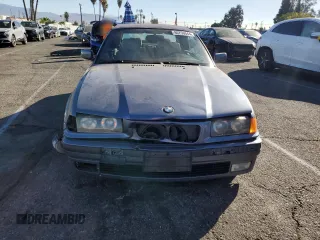 1999 BMW 3 Series 323icA with VIN WBABJ8332XEM24560, listed as a Copart auction lot 80756544 with 63,056 mi miles and Salvage Title. Bid and sale history available at carsss.com. Image 5.