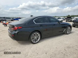 2023 BMW 5 Series 540i with VIN WBA53BJ07PCM01445, listed as a Copart auction lot 55084525 with 20,598 mi miles and Salvage title. Bid and sale history available at DreamBid. Image 3.