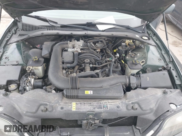 2002 Lincoln LS w/Base Pkg with VIN 1LNHM87A92Y685863, listed as a IAAI auction lot 41457021 with 145,022 mi miles. Bid and sale history available at carsss.com. Image 10.