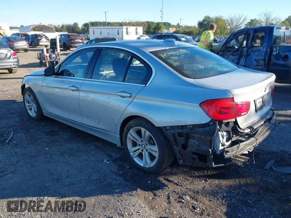 2017 BMW 3 Series 330i with VIN WBA8B9G30HNU57209, listed as a IAAI auction lot 40523376 with 94,338 mi miles. Bid and sale history available at carsss.com. Image 3.