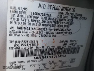 2005 Mercury Montego Premier with VIN 1MEFM43165G608323, listed as a Copart auction lot 77156404 with 138,150 mi miles and Salvage Title. Bid and sale history available at carsss.com. Image 14.