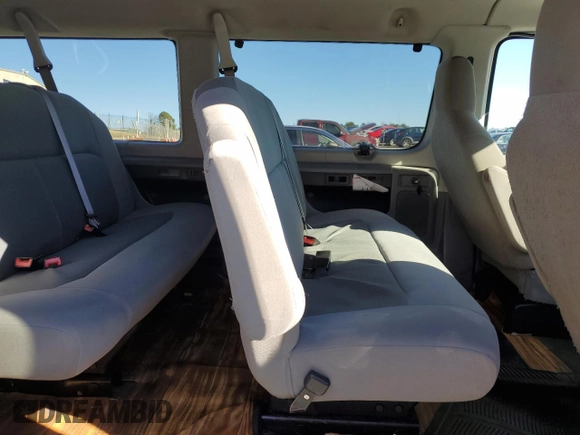 2009 Ford Econoline Passenger XL with VIN 1FBSS31L19DA07353, listed as a Copart auction lot 88078365 with 206,320 mi miles and Salvage title. Bid and sale history available at DreamBid. Image 12.