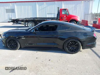 2015 Ford Mustang GT with VIN 1FA6P8CF4F5379607, listed as a IAAI auction lot 42039187 with 75,587 mi miles and . Bid and sale history available at carsss.com. Image 14.