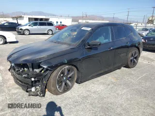 2024 BMW iX M60 with VIN WB533CF01RCR28341, listed as a Copart auction lot 69646904 with 1,753 mi miles and Salvage Title. Bid and sale history available at carsss.com. Image 1.