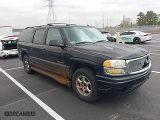 2004 GMC Yukon XL Denali with VIN 1GKFK66U54J263039, listed as a IAAI auction lot 41842234 with 1 mi miles. Bid and sale history available at carsss.com. Image 1.