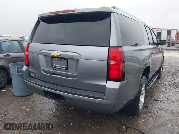 2019 Chevrolet Suburban LT with VIN 1GNSKHKCXKR405555, listed as a IAAI auction lot 42188860 with 143,435 mi miles and . Bid and sale history available at DreamBid. Image 4.