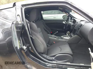 2016 Nissan 370Z with VIN JN1AZ4EHXGM935774, listed as a IAAI auction lot 41976743 with 66,979 mi miles. Bid and sale history available at carsss.com. Image 5.