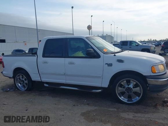 2001 Ford F-150 XLT with VIN 1FTRW07L81KE91672, listed as a IAAI auction lot 42021661 with 200,000 mi miles and . Bid and sale history available at DreamBid. Image 13.