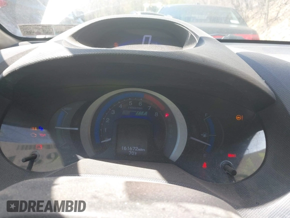 2011 Honda Insight with VIN JHMZE2H30BS012285, listed as a IAAI auction lot 42145139 with 161,672 mi miles and . Bid and sale history available at DreamBid. Image 7.