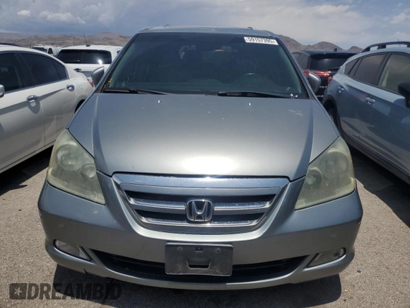 2005 Honda Odyssey Touring z VIN 5FNRL38805B131416, wystawiony jako Copart lot #59157395 z przebiegiem 263 087 mil mil oraz Szkoda całkowita • Salvage title. Historia ofert i sprzedaży dostępna na DreamBid. Obrazek 5.
