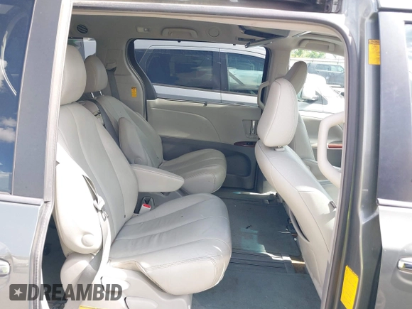 2014 Toyota Sienna XLE with VIN 5TDYK3DC2ES448876, listed as a IAAI auction lot 42519351 with 154,601 mi miles and . Bid and sale history available at DreamBid. Image 8.