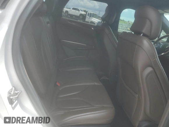 2017 Lincoln MKC Reserve with VIN 5LMCJ3C9XHUL19165, listed as a Copart auction lot 61538025 with 130,041 mi miles and Salvage title. Bid and sale history available at DreamBid. Image 11.