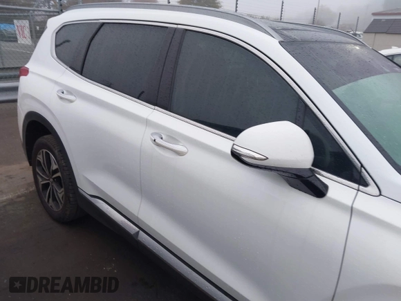 2019 Hyundai Santa Fe Ultimate with VIN 5NMS5CAA3KH036089, listed as a IAAI auction lot 40810710 with 62,561 mi miles and . Bid and sale history available at DreamBid. Image 13.