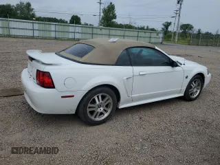 2004 Ford Mustang Deluxe with VIN 1FAFP446X4F238670, listed as a Copart auction lot 60922635 with 121,880 mi miles and Salvage title. Bid and sale history available at DreamBid. Image 3.