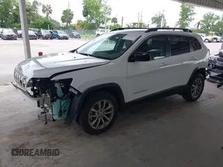 2022 Jeep Cherokee Latitude Lux z VIN 1C4PJLMXXND501689, wystawiony jako IAAI lot #42401720 z przebiegiem 34 037 mil mil oraz . Historia ofert i sprzedaży dostępna na DreamBid. Obrazek 2.