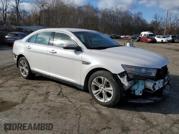 2019 Ford Taurus SEL with VIN 1FAHP2E82KG100142, listed as a Copart auction lot 88655505 with 106,959 mi miles and Salvage Title. Bid and sale history available at DreamBid. Image 4.