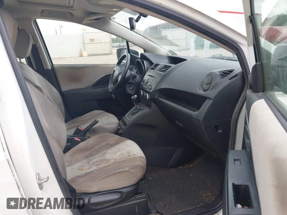 2014 Mazda 5 Touring with VIN JM1CW2CLXE0171407, listed as a IAAI auction lot 41902688 with 106,957 mi miles. Bid and sale history available at carsss.com. Image 5.