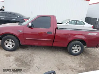2004 Ford F-150 Heritage XL with VIN 2FTRF17204CA08424, listed as a IAAI auction lot 41588440 with 197,523 mi miles. Bid and sale history available at carsss.com. Image 14.