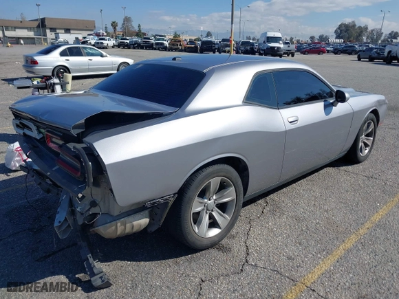 2017 Dodge Challenger SXT Plus with VIN 2C3CDZAG5HH502354, listed as a IAAI auction lot 41740550 with 131,860 mi miles. Bid and sale history available at carsss.com. Image 4.