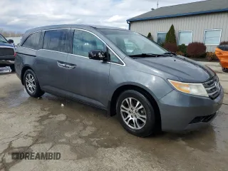 2013 Honda Odyssey EX z VIN 5FNRL5H40DB033400, wystawiony jako Copart lot #50552155 z przebiegiem 223 770 mil mil oraz Nie do naprawy. Historia ofert i sprzedaży dostępna na DreamBid. Obrazek 4.