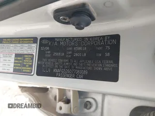 2007 Kia Rondo LX with VIN KNAFG526077069189, listed as a IAAI auction lot 42090474 with 96,722 mi miles. Bid and sale history available at carsss.com. Image 9.