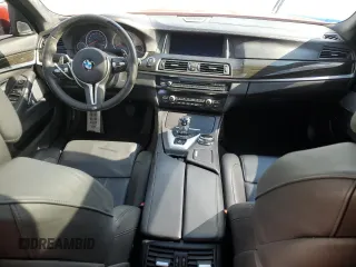 2014 BMW M5 z VIN WBSFV9C58ED097898, wystawiony jako Copart lot #86151234 z przebiegiem 60 470 mil mil oraz Tytuł czysty. Historia ofert i sprzedaży dostępna na DreamBid. Obrazek 8.