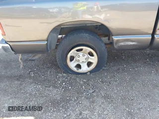 2002 Dodge 1500 z VIN 1D7HA16K72J251518, wystawiony jako IAAI lot #41680014 z przebiegiem 170 376 mil mil oraz . Historia ofert i sprzedaży dostępna na DreamBid. Obrazek 17.
