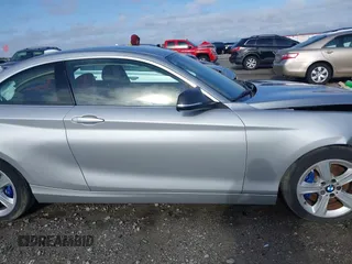 2016 BMW 2 Series 228i with VIN WBA1F9C58GV546490, listed as a IAAI auction lot 41811819 with 69,434 mi miles. Bid and sale history available at carsss.com. Image 14.