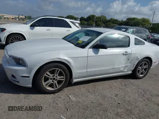 2014 Ford Mustang V6 with VIN 1ZVBP8AM1E5231243, listed as a IAAI auction lot 41730357 with 211,508 mi miles. Bid and sale history available at carsss.com. Image 6.